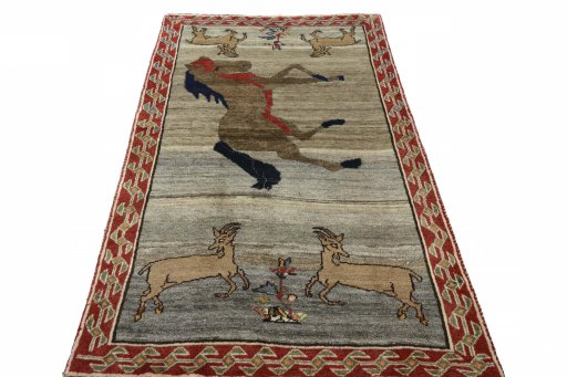Surface texture of 2000s Persian Gabbeh rug with natural Wool and intricate pattern