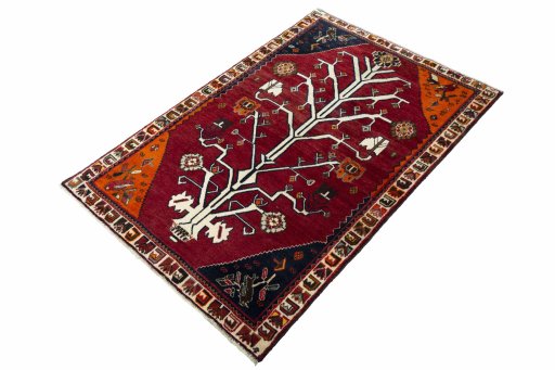 Corner detail of 2000s Persian Gabbeh rug showing border pattern and Wool pile