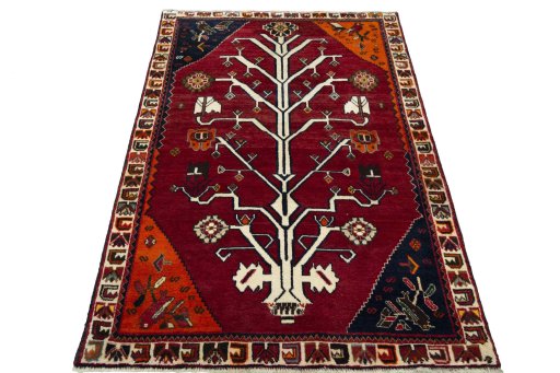 Surface texture of 2000s Persian Gabbeh rug with natural Wool and intricate pattern