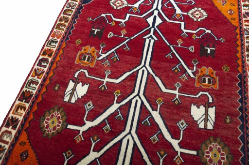 Backside of handmade 2000s Persian Gabbeh rug showing knot structure and weave density