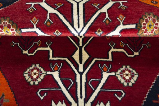 Full view of 2000s Persian Gabbeh rug from Iran / Persia, 164 × 106 cm in Red tones
