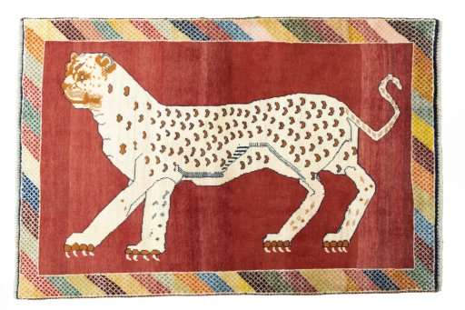 Full view of 2000s Persian Gabbeh rug from Iran / Persia, 181 × 120 cm in Red tones