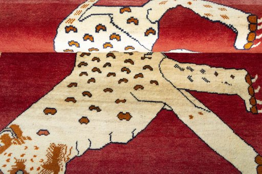 Full view of 2000s Persian Gabbeh rug from Iran / Persia, 181 × 120 cm in Red tones