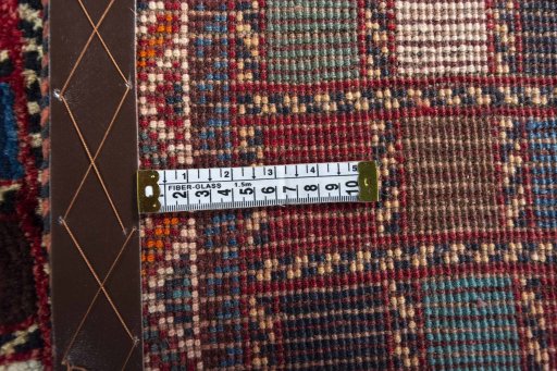 Close-up detail of 2000s Persian Gabbeh rug from Iran / Persia showing Wool weave
