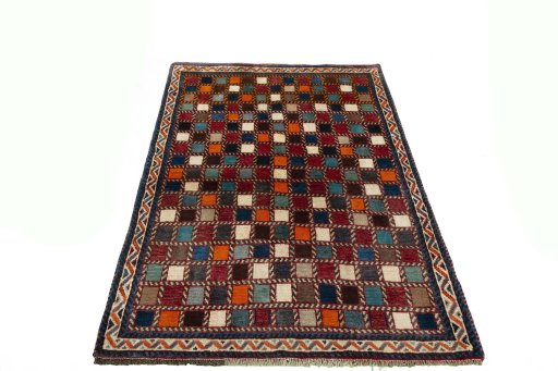 Surface texture of 2000s Persian Gabbeh rug with natural Wool and intricate pattern