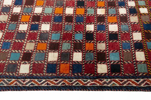 Close-up detail of 2000s Persian Gabbeh rug from Iran / Persia showing Wool weave