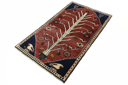 Corner detail of 2000s Persian Gabbeh rug showing border pattern and Wool pile