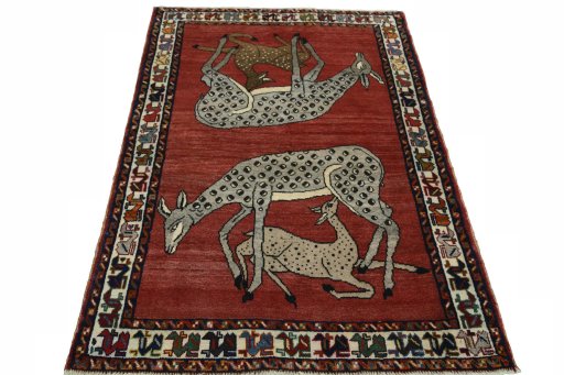 Surface texture of 2000s Persian Gabbeh rug with natural Wool and intricate pattern