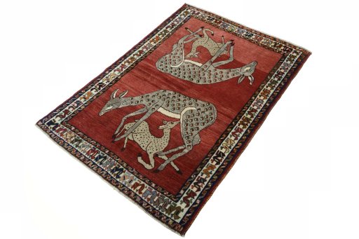 Corner detail of 2000s Persian Gabbeh rug showing border pattern and Wool pile