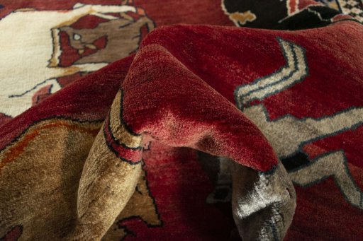 Corner detail of 2000s Persian Gabbeh rug showing border pattern and Wool pile