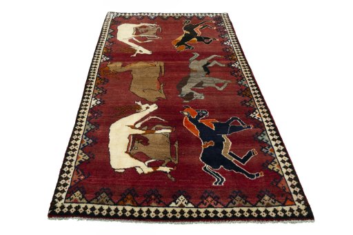 Surface texture of 2000s Persian Gabbeh rug with natural Wool and intricate pattern