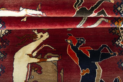 Full view of 2000s Persian Gabbeh rug from Iran / Persia, 215 × 121 cm in Red tones