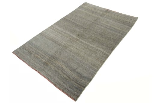 Corner detail of New Persian Gabbeh rug showing border pattern and Wool pile