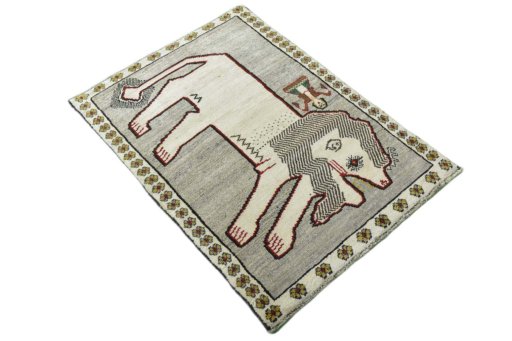 Close-up detail of 2000s Persian Gabbeh rug from Iran / Persia showing Wool weave