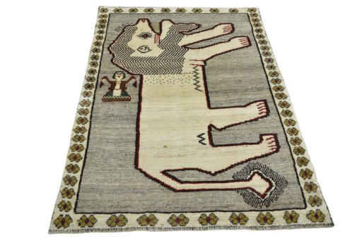 Surface texture of 2000s Persian Gabbeh rug with natural Wool and intricate pattern