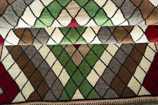 Full view of 2000s Persian Gabbeh rug from Iran / Persia, 211 × 116 cm in Multi Color tones