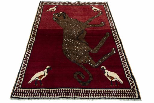 Surface texture of 2000s Persian Gabbeh rug with natural Wool and intricate pattern