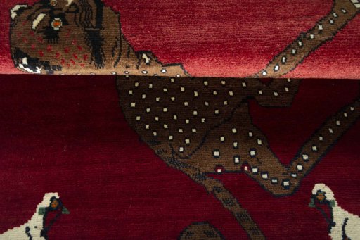 Full view of 2000s Persian Gabbeh rug from Iran / Persia, 174 × 122 cm in Red tones