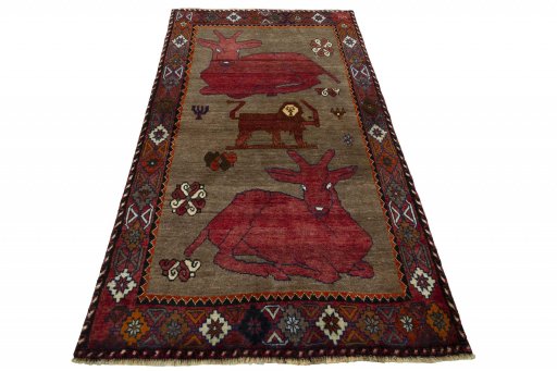 Surface texture of 2000s Persian Gabbeh rug with natural Wool and intricate pattern