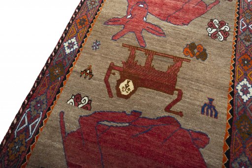 Backside of handmade 2000s Persian Gabbeh rug showing knot structure and weave density