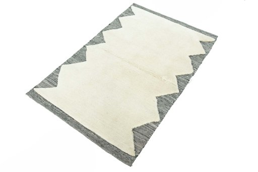 Corner detail of New Persian Gabbeh rug showing border pattern and Wool pile