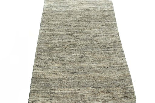 Surface texture of 2000s Persian Gabbeh rug with natural Wool and intricate pattern