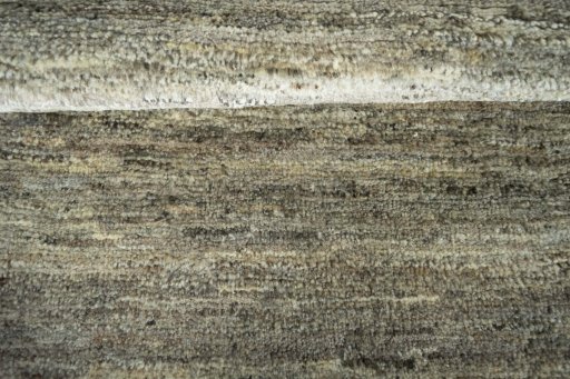 Full view of 2000s Persian Gabbeh rug from Iran / Persia, 126 × 81 cm in Gray tones