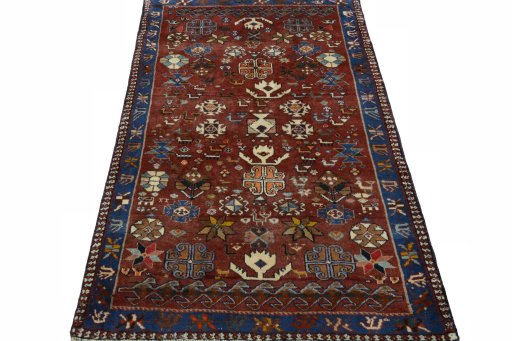 Surface texture of 2000s Persian Gabbeh rug with natural Wool and intricate pattern