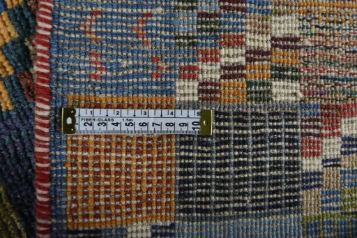 Close-up detail of 2000s Persian Gabbeh rug from Iran / Persia showing Wool weave