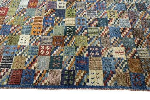 Close-up detail of 2000s Persian Gabbeh rug from Iran / Persia showing Wool weave