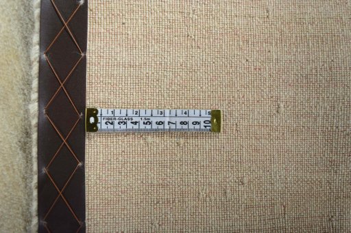 Corner detail of New Persian Gabbeh rug showing border pattern and Wool pile