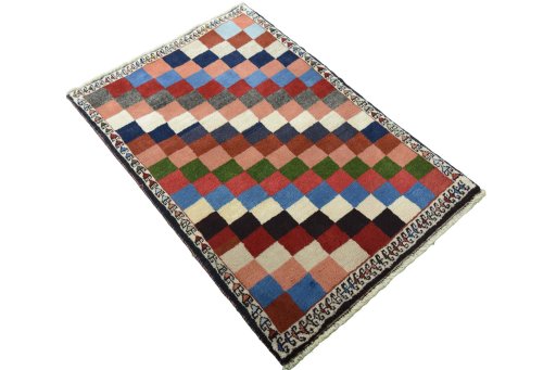 Close-up detail of 2000s Persian Gabbeh rug from Iran / Persia showing Wool weave