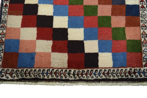 Central medallion detail of 2000s Persian Gabbeh rug from Iran / Persia