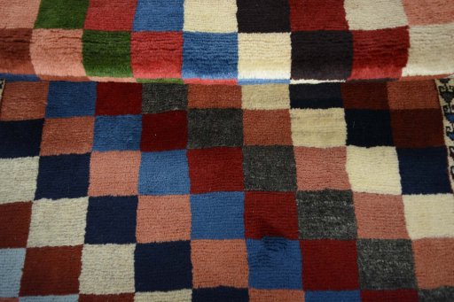 Full view of 2000s Persian Gabbeh rug from Iran / Persia, 125 × 83 cm in Multi Color tones