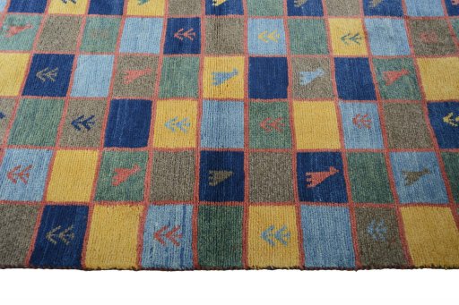 Close-up detail of 2000s Persian Gabbeh rug from Iran / Persia showing Wool weave