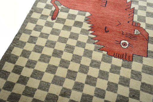 Backside of handmade New Persian Gabbeh rug showing knot structure and weave density