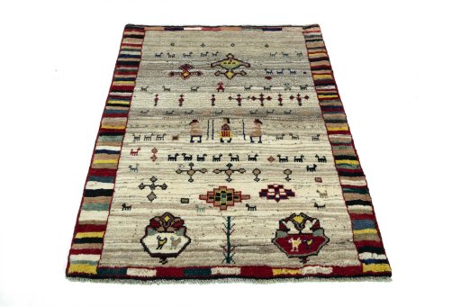 Surface texture of 2000s Persian Gabbeh rug with natural Wool and intricate pattern