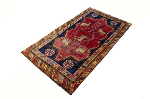 Corner detail of 2000s Persian Gabbeh rug showing border pattern and Wool pile