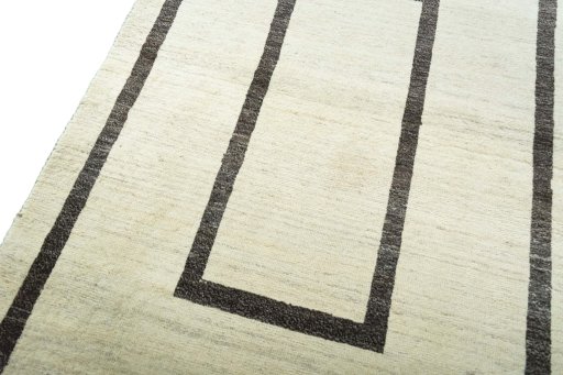 Backside of handmade New Persian Gabbeh rug showing knot structure and weave density