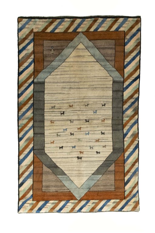 Full view of 2000s Persian Gabbeh rug from Iran / Persia, 245 × 153 cm in Beige tones