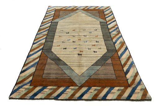 Surface texture of 2000s Persian Gabbeh rug with natural Wool and intricate pattern