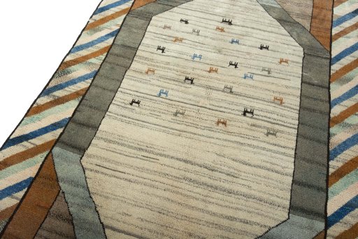 Backside of handmade 2000s Persian Gabbeh rug showing knot structure and weave density