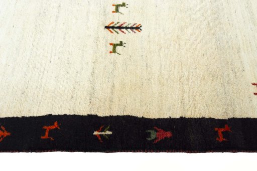 Close-up detail of 2000s Persian Gabbeh rug from Iran / Persia showing Wool weave
