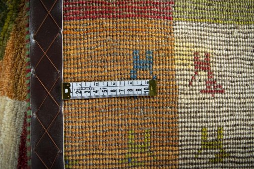 Close-up detail of 2000s Persian Gabbeh rug from Iran / Persia showing Wool weave