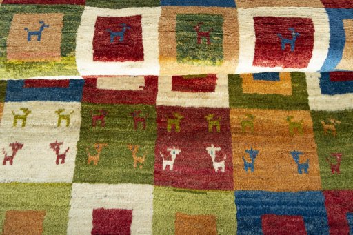 Full view of 2000s Persian Gabbeh rug from Iran / Persia, 165 × 112 cm in Multi Color tones