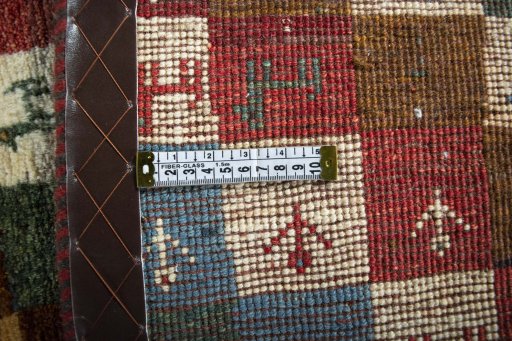 Close-up detail of 2000s Persian Gabbeh rug from Iran / Persia showing Wool weave