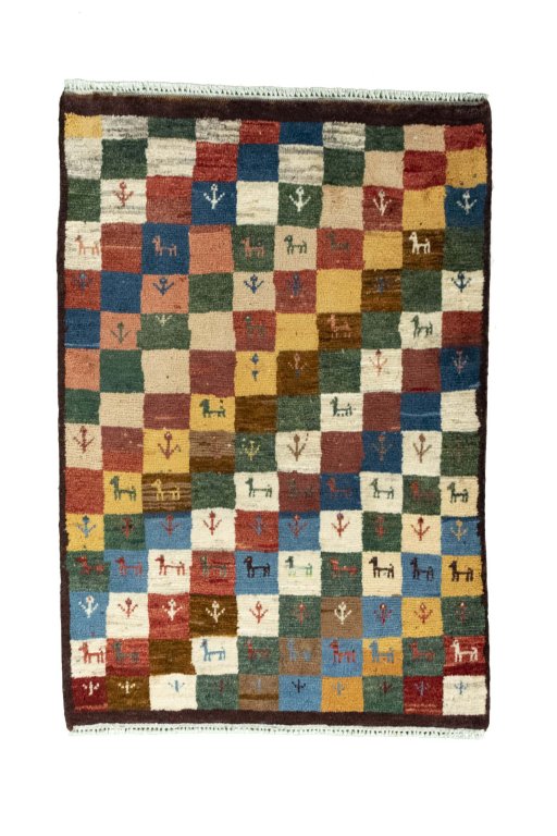 Full view of 2000s Persian Gabbeh rug from Iran / Persia, 120 × 82 cm in Multi Color tones
