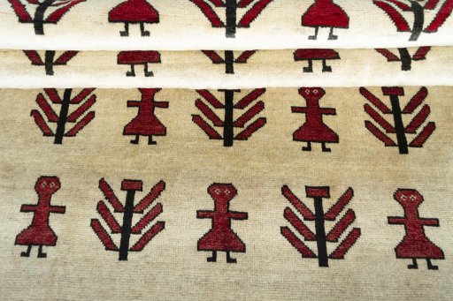Full view of 2000s Persian Gabbeh rug from Iran / Persia, 215 × 133 cm in Beige tones