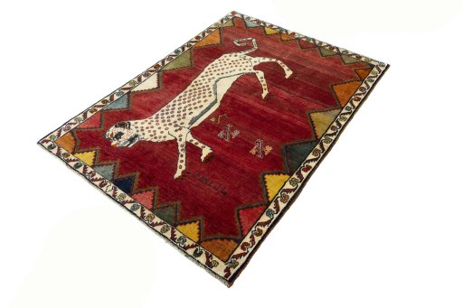 Corner detail of 2000s Persian Gabbeh rug showing border pattern and Wool pile