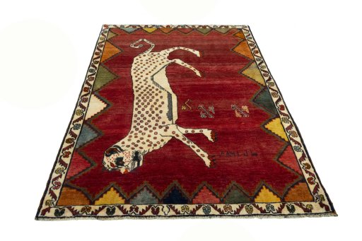 Surface texture of 2000s Persian Gabbeh rug with natural Wool and intricate pattern